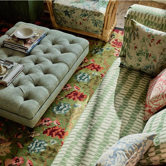 Bedham Footstool in RHS Gertrude Jekyll Lattice Green with Exbury 3 Seater Sofa in V&A Brompton Collecion Ikat Basil